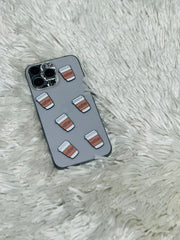 Grey phone case with white and brown coffee cup charms